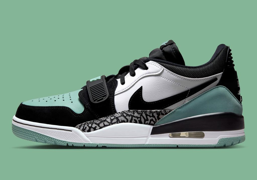 Il verde pastello si posa sulle Jordan Legacy 312 Low.